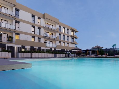 Gran piscina de la promoción Zeta Place de AEDAS Homes en el nuevo barrio de Distrito Zeta en Málaga